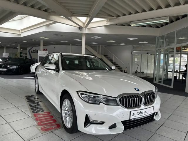 BMW 3 Serie 330 Luxury Line xDrive Touring 330e